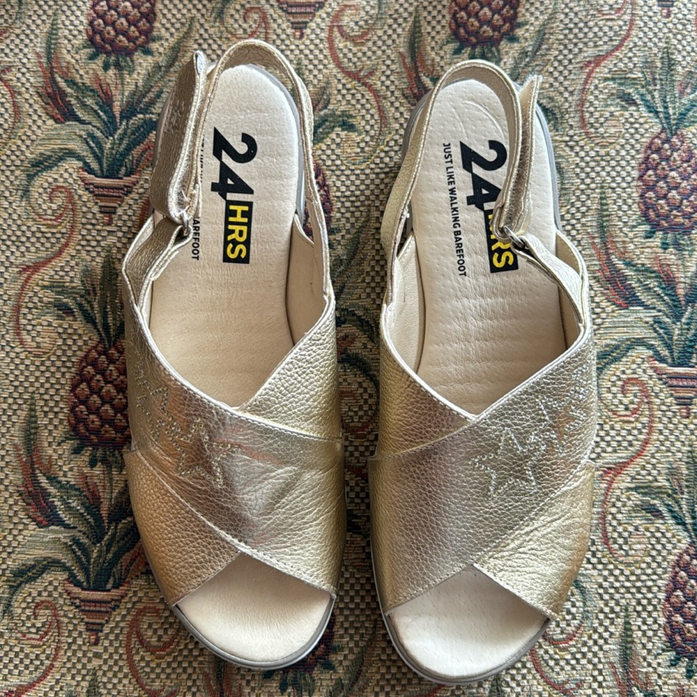 Gold sandal by 24 hr. Made in Spain. Size 37 ladies (7) like new.